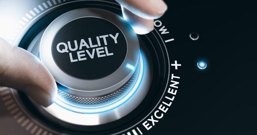 Hand turning a quality knob to improve the quality. Composite image between a hand photography and a 3D background.